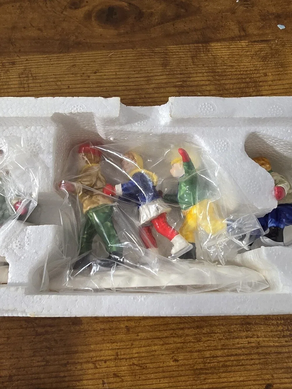 Department 56 Snow Village figurines titled 